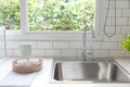 Modern kitchen with white worktop sink Royalty Free Stock Photo