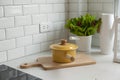 Modern kitchen with white worktop sink