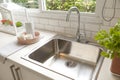 Modern kitchen with white worktop sink
