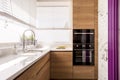 Modern kitchen with wood accents Royalty Free Stock Photo