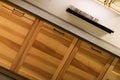 Modern kitchen wooden cabinets shot with dutch tilt angle