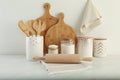 Modern kitchenware and products on white marble table