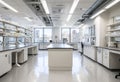 Modern laboratory interior featuring spacious workstations, bright natural light streaming through large windows, and organized Royalty Free Stock Photo