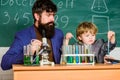 Modern Laboratory. son and father at school. Biologist Conducts Experiments by Synthesising Compounds. Back to school