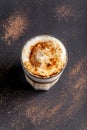 Modern, lactose-free Latte or Cappuccino coffee with almond milk. Above the fire sugar burned sugar. Caramel crust Royalty Free Stock Photo