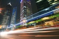 Modern landmark building background of car night with light trails