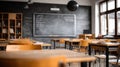 Modern Language School Classroom with Chalkboard and Empty Desks Royalty Free Stock Photo