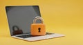 Laptop Computer with an Orange Padlock Secured on the Keyboard Against a Yellow Background Royalty Free Stock Photo