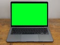 Modern Laptop Computer with Green Screen