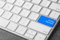 Modern laptop keyboard with text Online Payment on blue button, closeup view Royalty Free Stock Photo