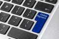 Modern laptop keyboard with text Online Payment on blue button, closeup view Royalty Free Stock Photo