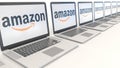 Modern laptops with Amazon.com logo. Computer technology conceptual editorial 3D rendering