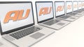 Modern laptops with au mobile phone company logo. Computer technology conceptual editorial 3D rendering