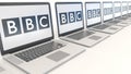 Modern laptops with British Broadcasting Corporation BBC logo. Computer technology conceptual editorial 3D rendering