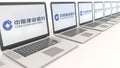 Modern laptops with China Construction Bank logo. Computer technology conceptual editorial 3D rendering