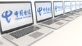Modern laptops with China Telecom logo. Computer technology conceptual editorial 3D rendering