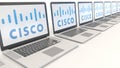 Modern laptops with Cisco Systems logo. Computer technology conceptual editorial 3D rendering