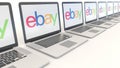 Modern laptops with eBay Inc. logo. Computer technology conceptual editorial 4K clip, seamless loop