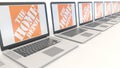 Modern laptops with The Home Depot logo. Computer technology conceptual editorial 3D rendering
