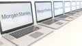 Modern laptops with Morgan Stanley Inc. logo. Computer technology conceptual editorial 3D rendering