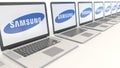 Modern laptops with Samsung logo. Computer technology conceptual editorial 3D rendering