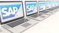 Modern laptops with SAP SE logo. Computer technology conceptual editorial 3D rendering