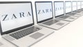 Modern laptops with Zara logo. Computer technology conceptual editorial 3D rendering