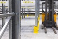 Modern large warehouse space interior, new and modern distribution storage with rows of empty high shelves and racks, concrete and Royalty Free Stock Photo