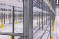 Modern large warehouse space interior, new and modern distribution storage with rows of empty high shelves and racks, concrete and Royalty Free Stock Photo