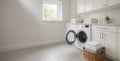 Modern laundry space with minimalist design featuring washing machine, elegant cabinets, and soft natural light for efficient Royalty Free Stock Photo