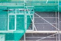 Modern layout of the construction of walls with scaffolding. External wall insulation systems Royalty Free Stock Photo