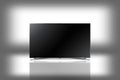 Modern LED full HD tv in white background with reflection