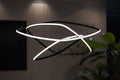 Modern led pendant light lamp illuminated, fashionable designer chandelier in the form of curve rings Royalty Free Stock Photo