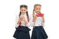 Modern life. Mobile addiction. Worldwide net. Internet resource has hazards for kids. Girls school uniform surfing