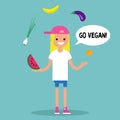 Modern lifestyle. Go vegan. Young blond girl juggling fruits and