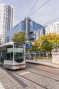 Modern light rail city tram passing through the city of Rotterdam Royalty Free Stock Photo
