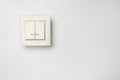 Modern light switch on white background. Space for text Royalty Free Stock Photo