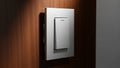Modern Light Switch on a Wood Grain Wall with Dramatic Lighting Keywords: light switch, toggle, dimmer, electrical Royalty Free Stock Photo