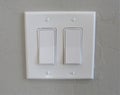 Modern light switches on a wall Royalty Free Stock Photo