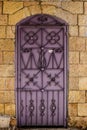 Modern lilac metal door openwork a beautiful vintage background Royalty Free Stock Photo