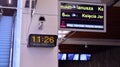 A modern live departure train board above a Warsaw metro line 2 platform. Departure sign in Warszawa Mlynow metro train station.