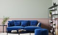 Modern living room design, blue sofa on bright interior background Royalty Free Stock Photo