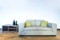 Modern living room detail with contemporary sofa Royalty Free Stock Photo