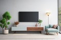 Modern living room features TV on cabinet against a blue wall