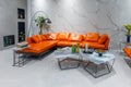 Modern living room furniture in house Orange leather sofa Royalty Free Stock Photo