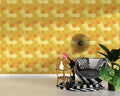 Modern living room interior with armchair decoration and green plants on hexagon yellow and orange tile texture wall background, Royalty Free Stock Photo