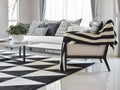 Modern living room interior with black and white checked pattern pillows and carpet Royalty Free Stock Photo