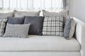 Modern living room interior with black and white checked pattern pillows Royalty Free Stock Photo