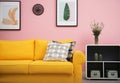 Modern living room interior with comfortable sofa near color wall Royalty Free Stock Photo