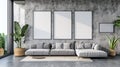 Modern living room interior with grey sofa and blank picture frames Royalty Free Stock Photo
